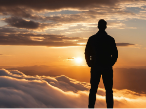 Man looking at sunrise